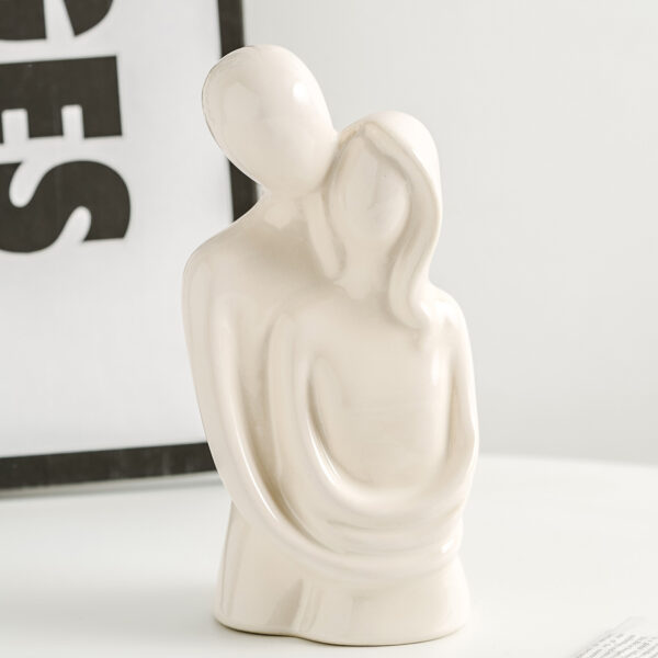 T1 white A ceramic decoration with black couple shape