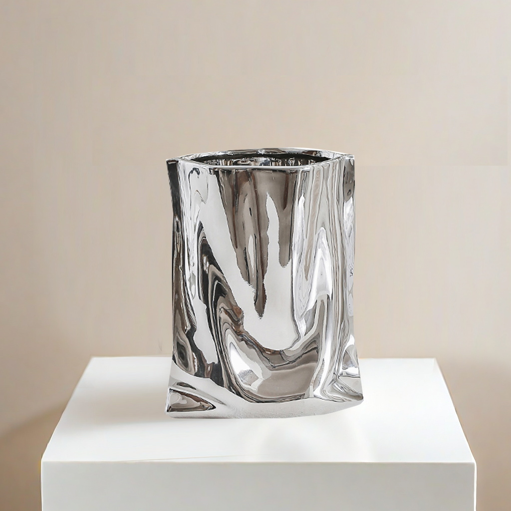 T2  A vase shaped like a silver paper bag