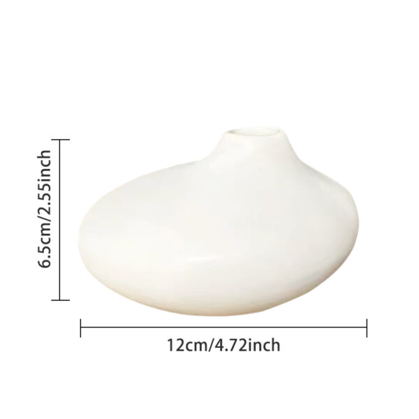 T37 A white stone vase